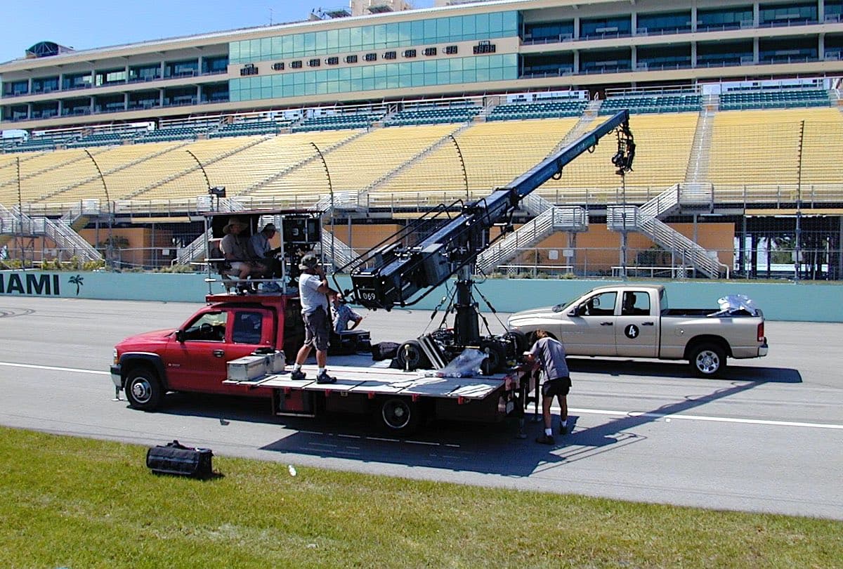 Supertechno Truck at racetrack with crane