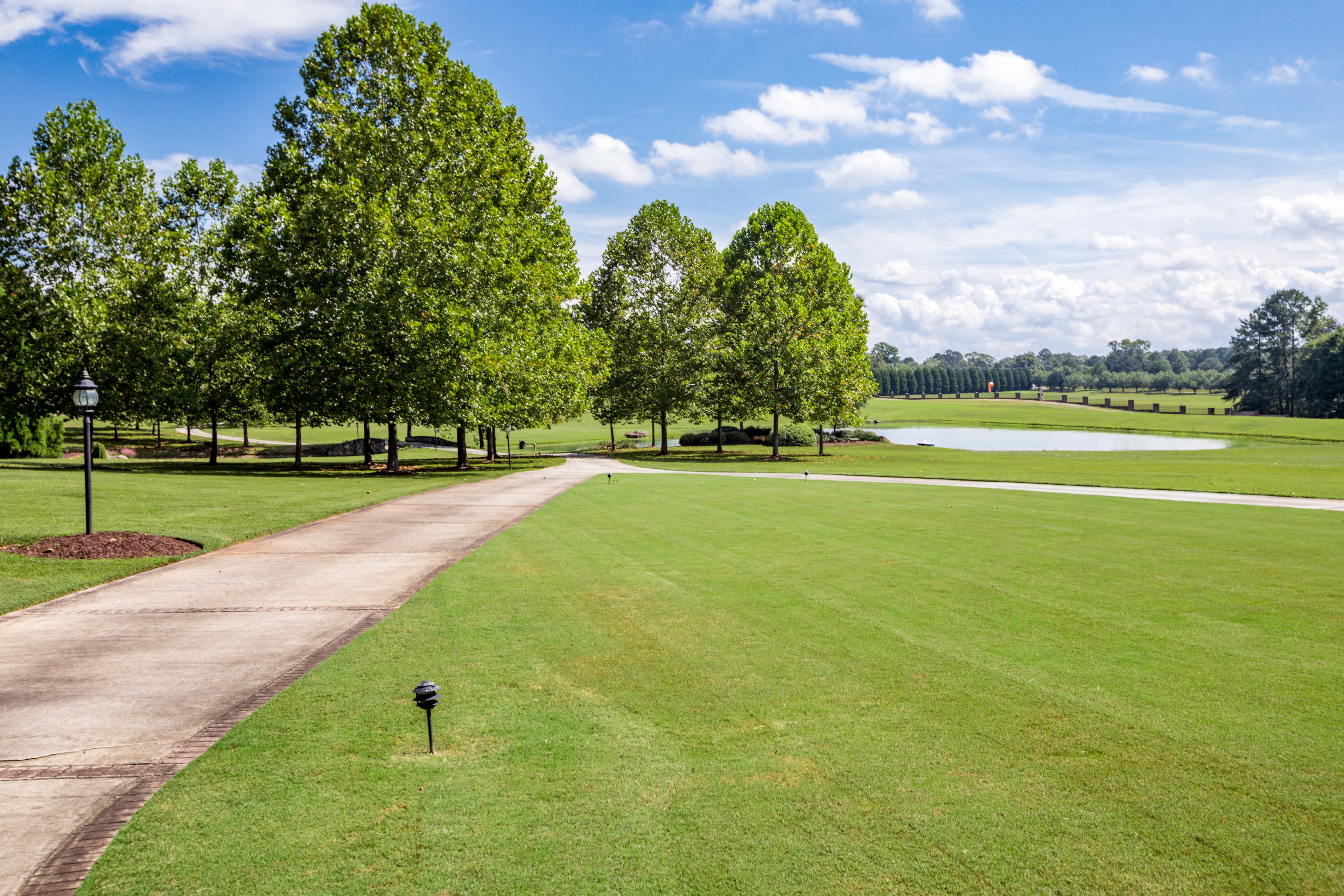 Manicured grounds with pond